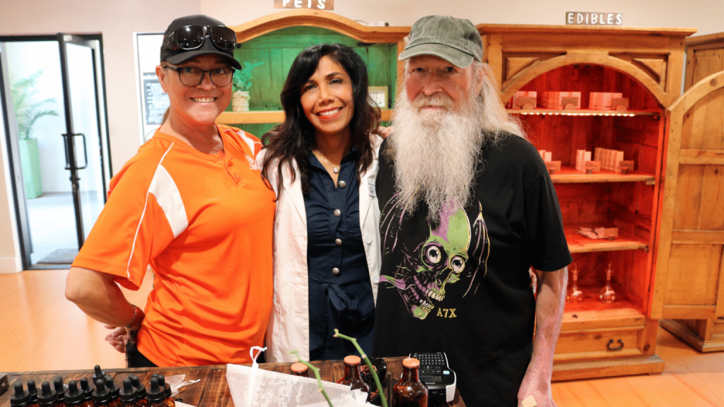 Image showing Dr. Peggy with elderly people educating on benefits of CBD.